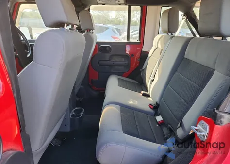 2009 Jeep Wrangler Unlimited X from USA, damaged, VIN 1J4GZ39169L720393